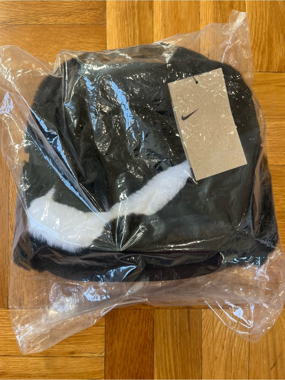 Nike Black Mini backpack faux fur with White Swoosh Accent